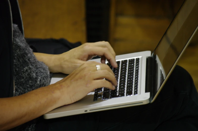 a close up view of someone using a laptop