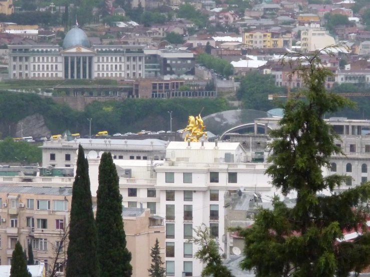 a large city with some buildings and trees