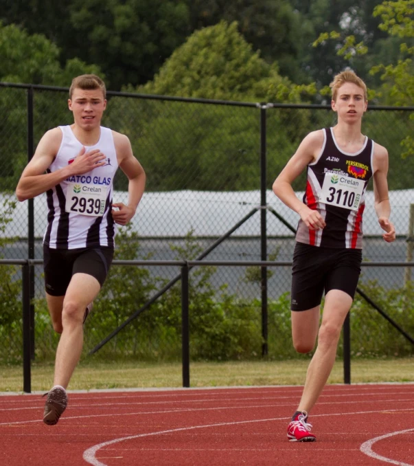 two men racing each other on a track