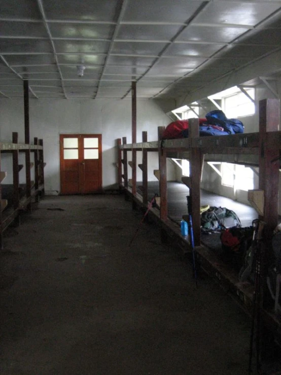 bunk beds are lined up in the small room