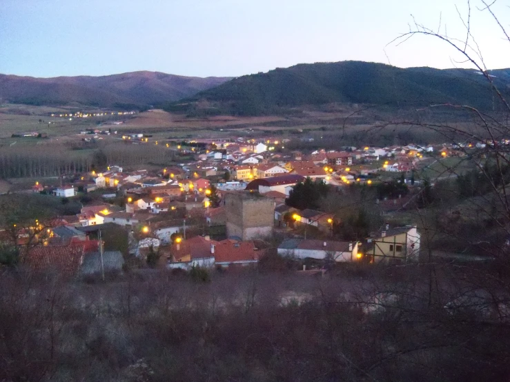 an image of a village at night