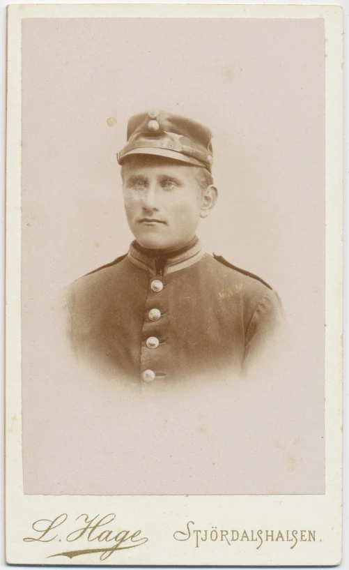 a military man in uniform is looking to his left