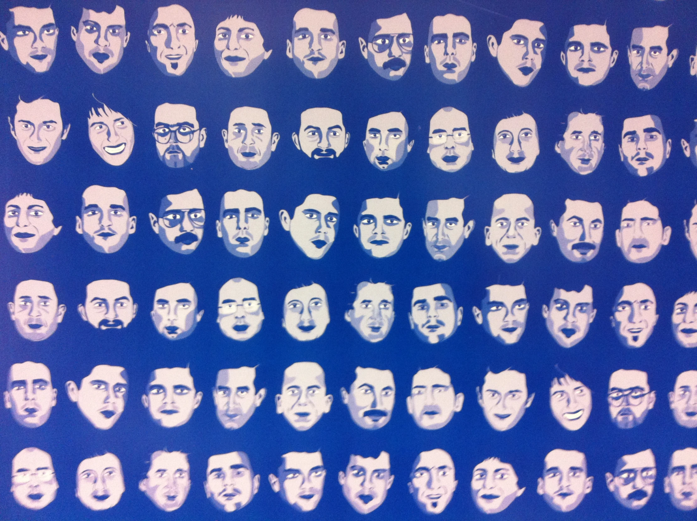 a blue painting with a bunch of heads in a group