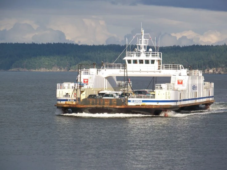 there is a large boat floating through the water