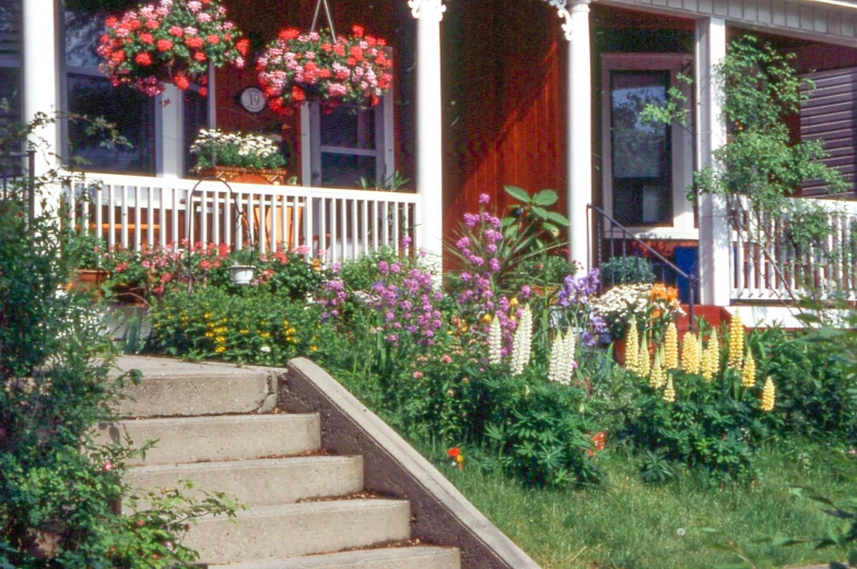 a set of stairs leading up to a covered porch