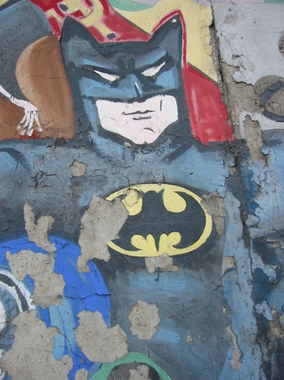 a painting of batman with an evil man next to it