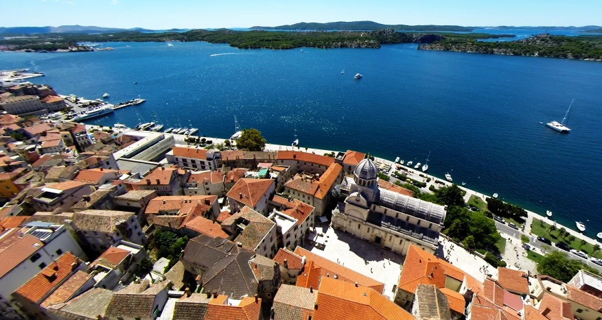 a bird's eye view of several boats on water