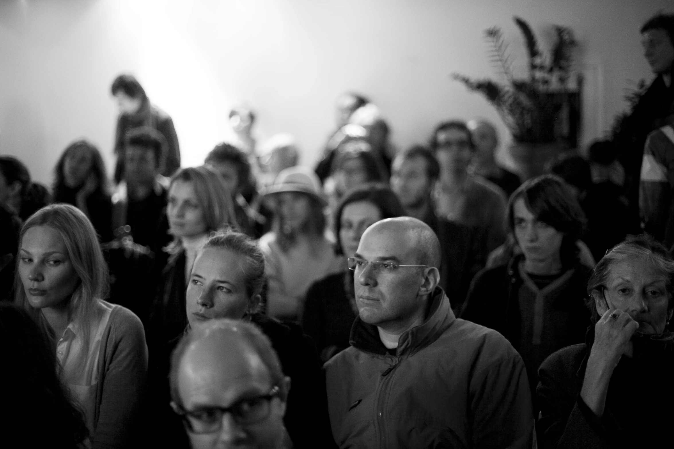 a black and white po of people standing together