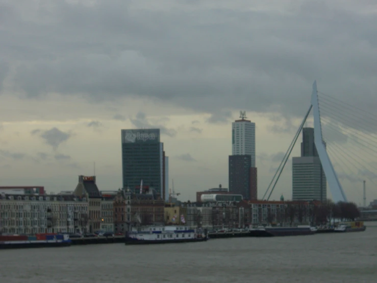 some buildings and a bridge in the background