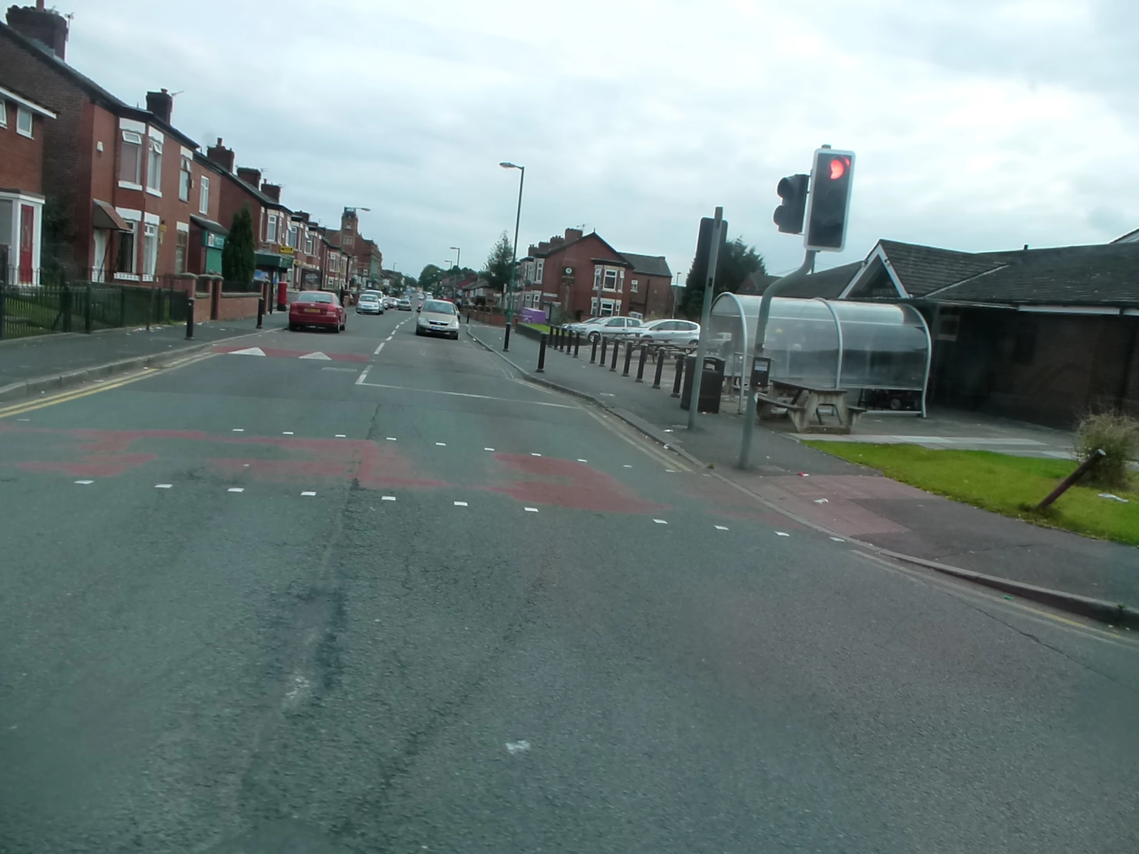 a road is blocked off with a green light