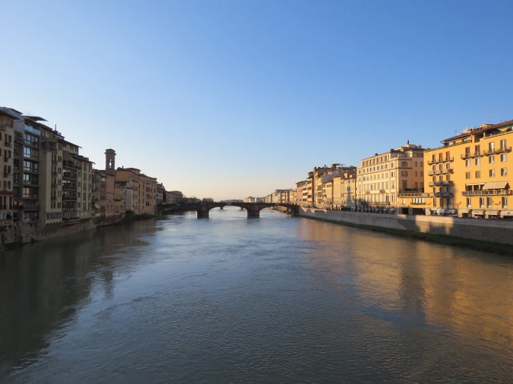 a river running through an old european city