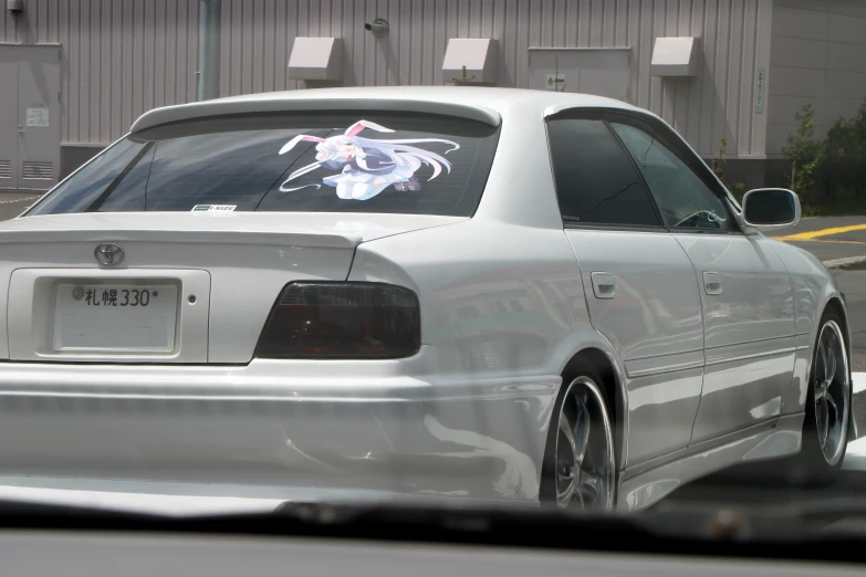 a car with white writing on its hood