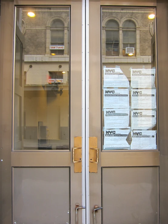 this door is showing the building across the street