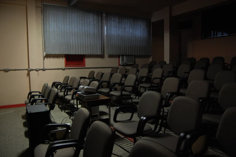 a room with several empty chairs in it