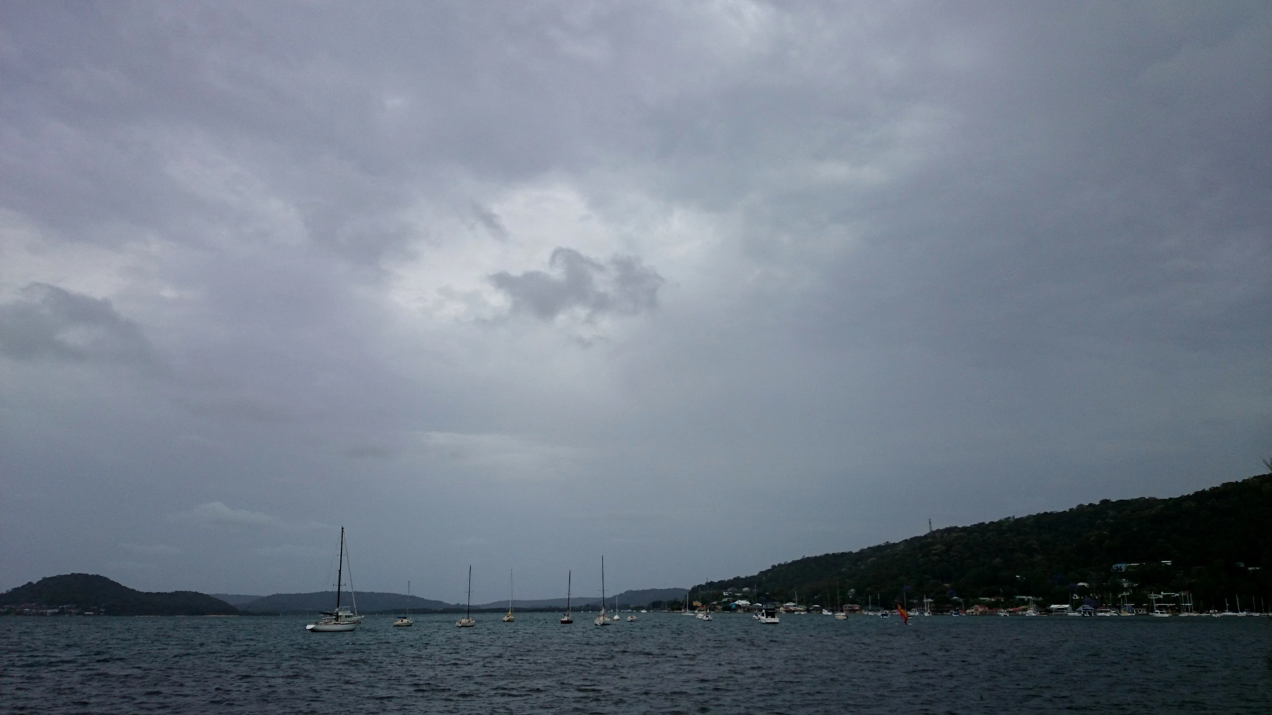 an image of boats floating in the water