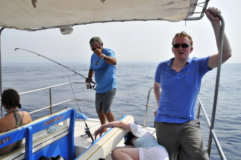 the men have to put their fish into the boat