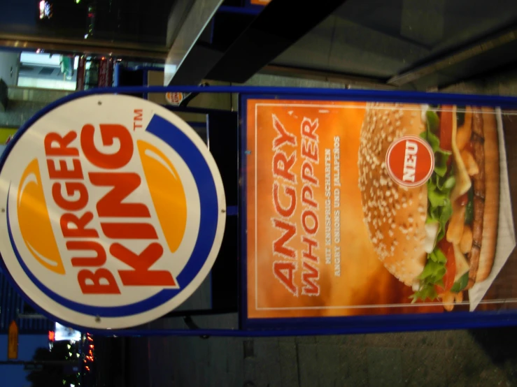 two signs, one for burger king and the other for burger king burger