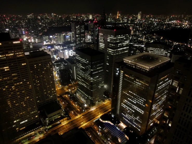 this aerial view shows the entire city skyline at night