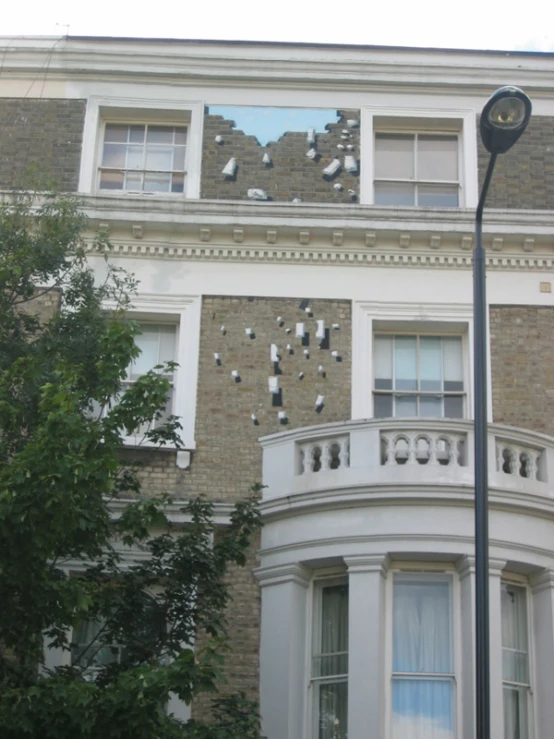 a building that is a clock and some trees