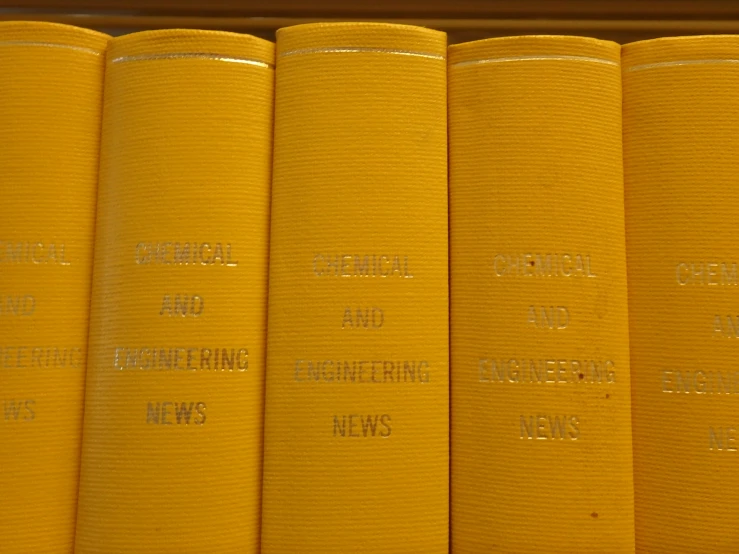 the yellow books have different phrases written on them
