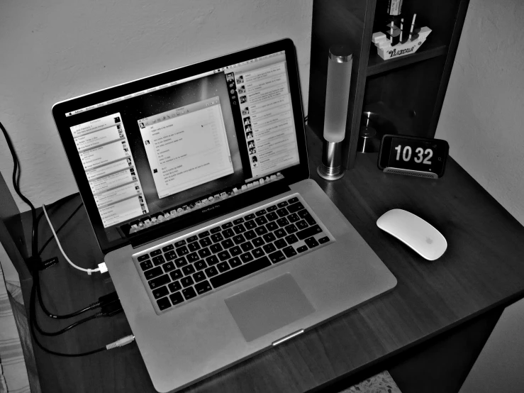 a laptop computer sitting on top of a desk