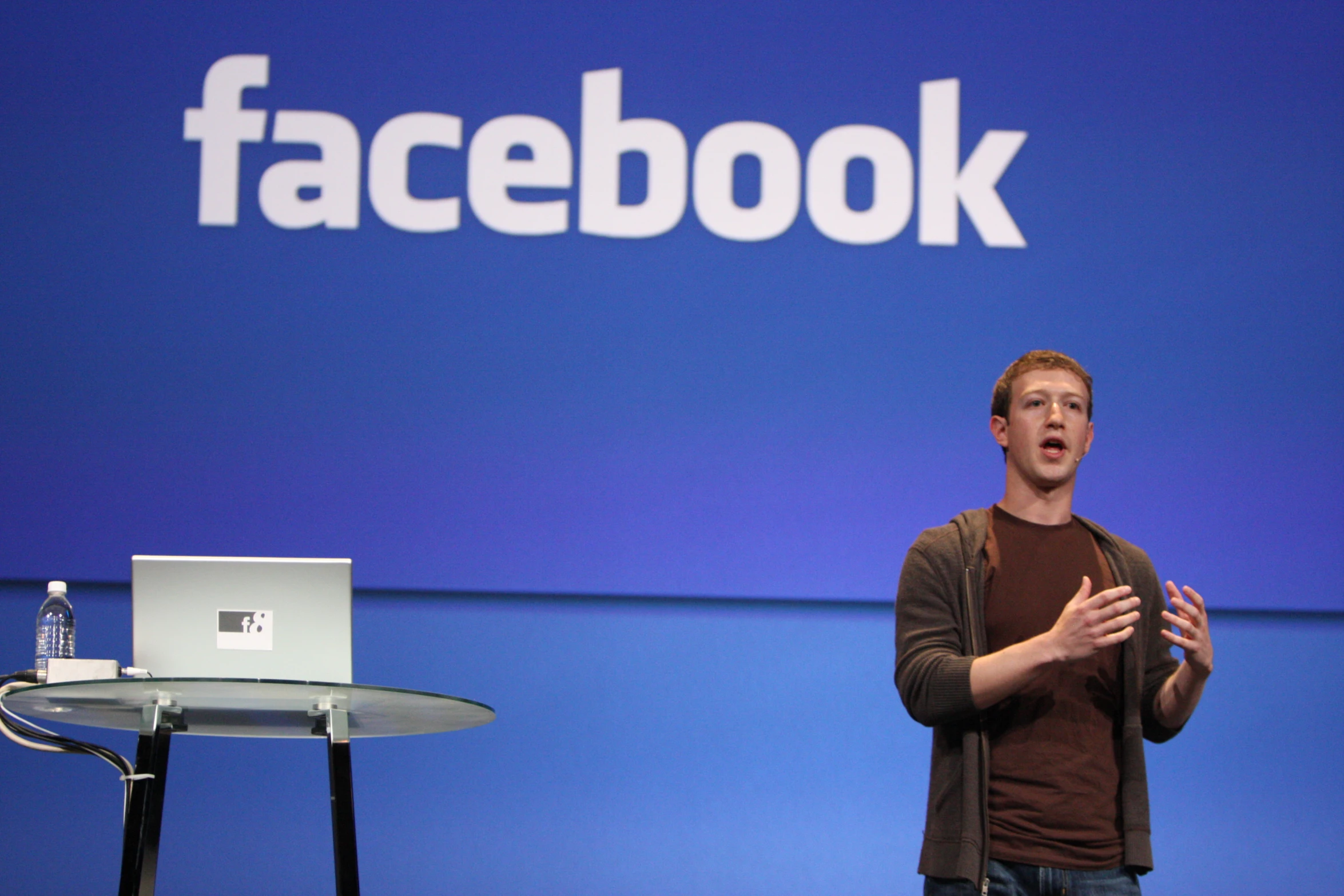 a man is talking at a facebook event