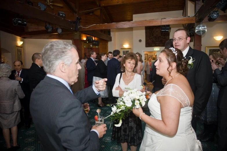 a man and woman having a wedding reception