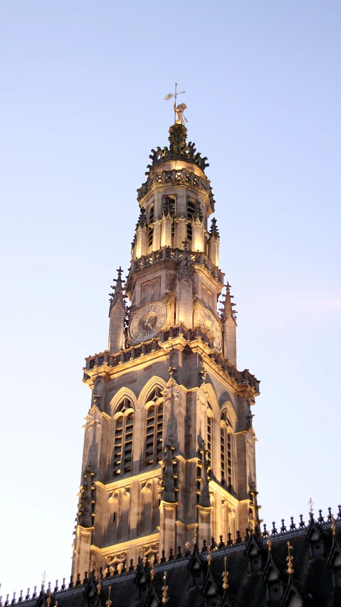 a very tall building with a clock on top