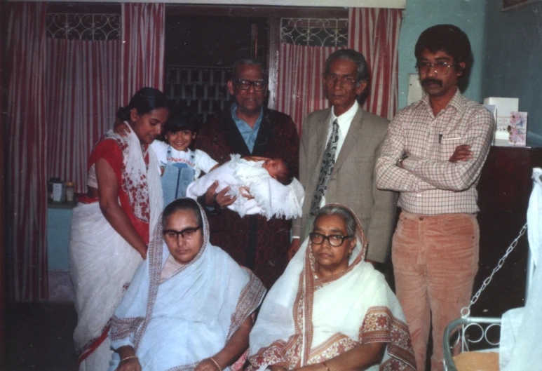 a group of people posing for the camera