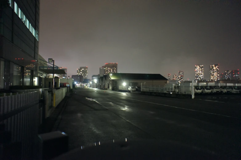 a dark picture of a train with many lights