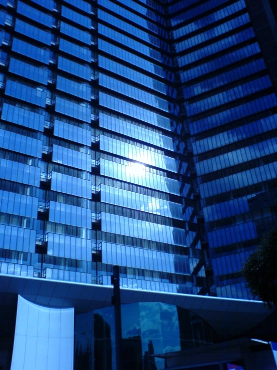 an abstract view of blue, rectangular tiles at night