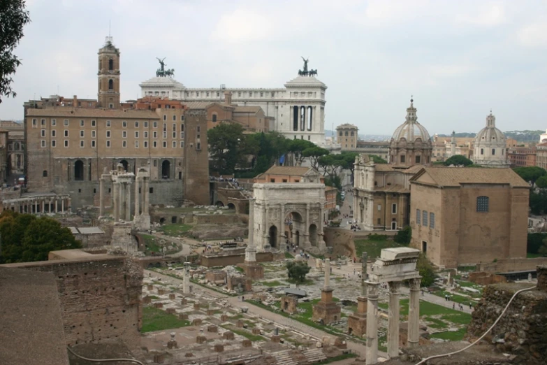 the ruins of buildings in a city are next to one another