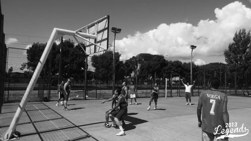 a basketball team gets ready to practice on the court