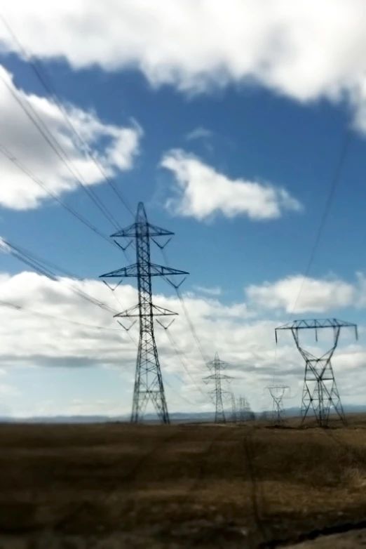 the power lines are shown against the sky