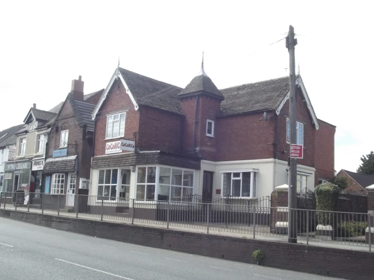 a street view shows some buildings that are brick