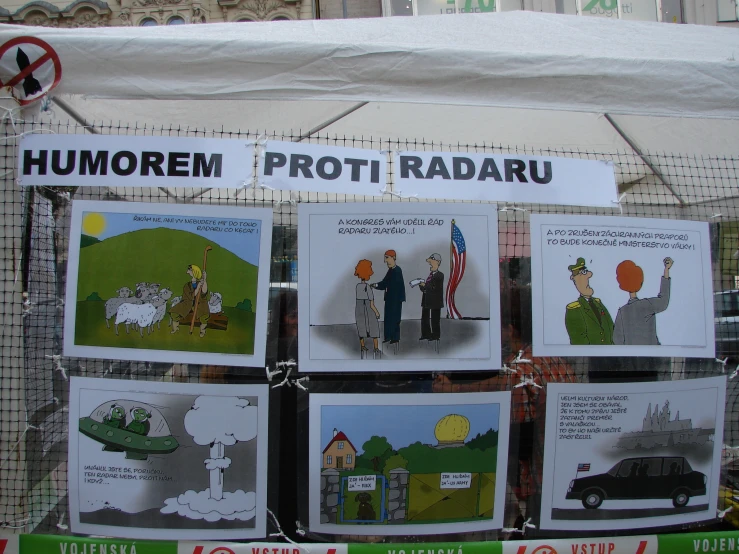 posters and papers about political cartoon on the front