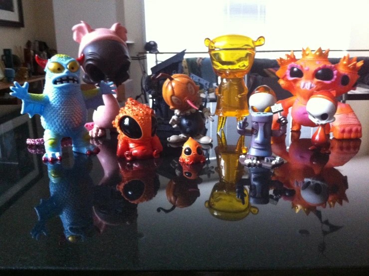 a variety of toy figurines that look like monsters