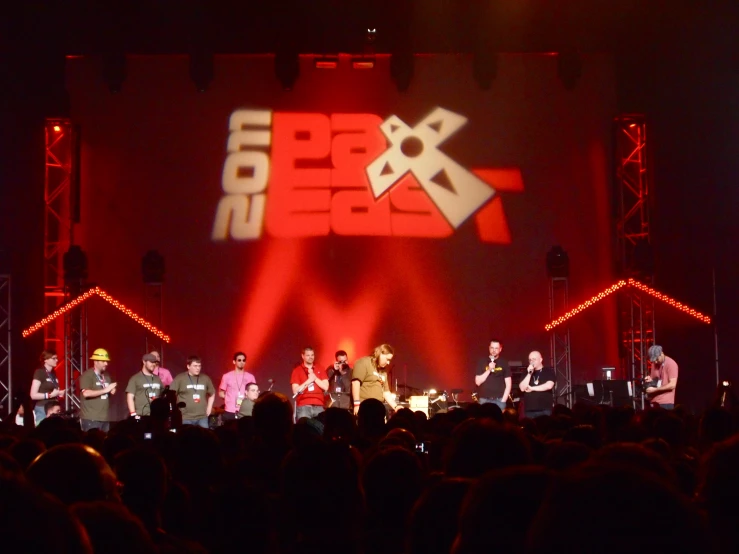 an orchestra is performing at an event on stage