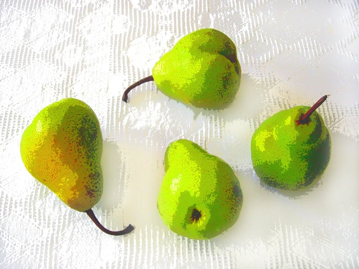 a bunch of pears that are sitting on the surface