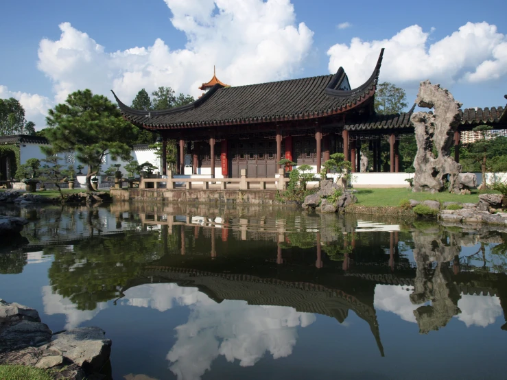 a large building next to a body of water