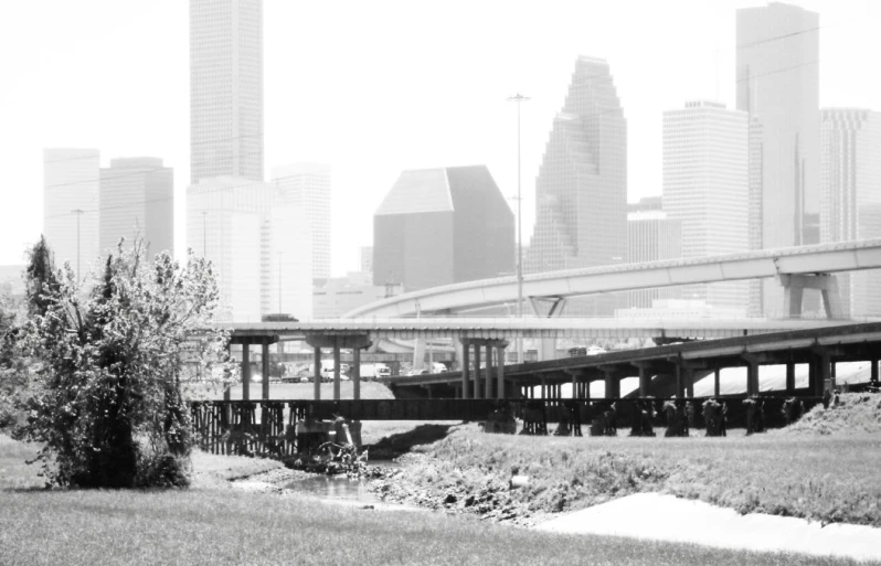 a large river next to the city skyline