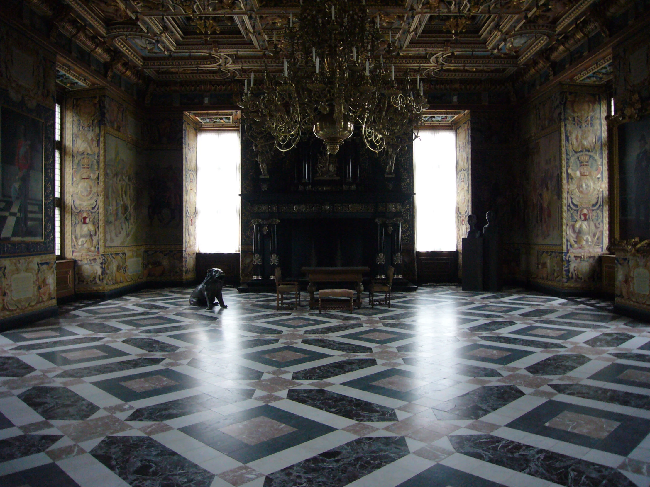 a person kneeling on the floor in an old building