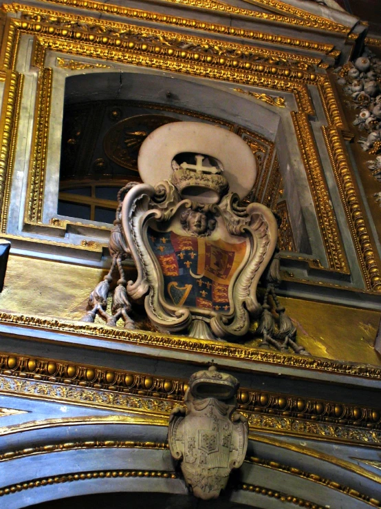there is a golden and blue ornate decor in the building