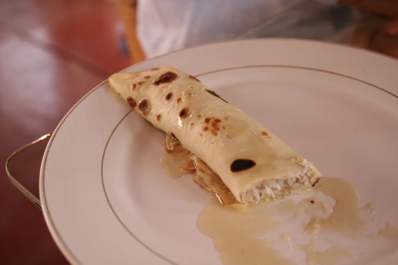 a plate has a piece of quesadilla on it