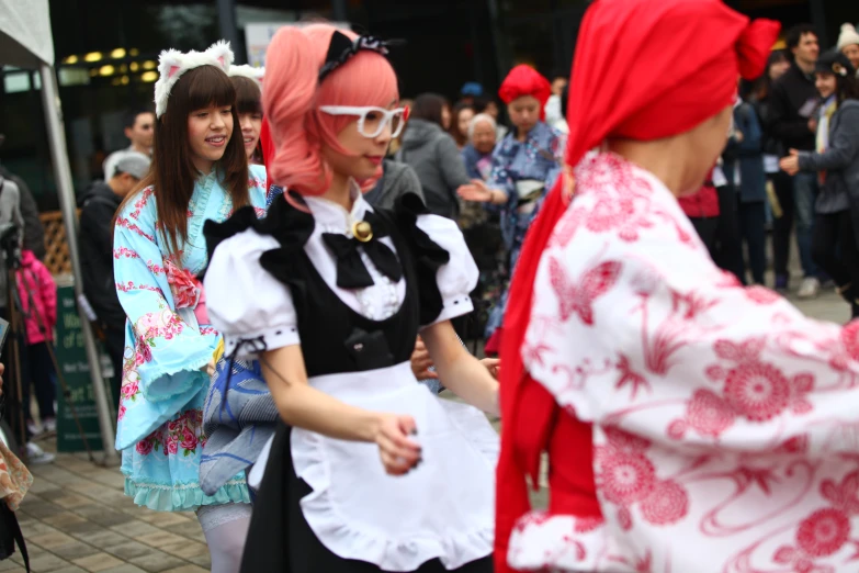two ladies dressed up as characters talking to each other