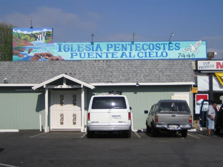 the front of an ice cream shop with a sign for its business