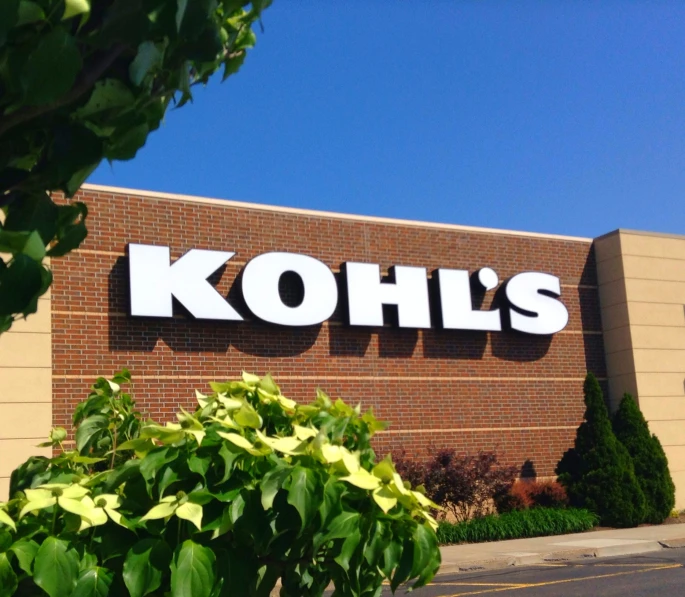 the kohl's storefront is covered in a sign