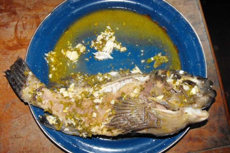 a plate of food with fish on it