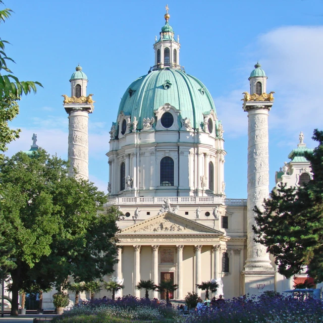 there is a large dome and bell top at the center of this building