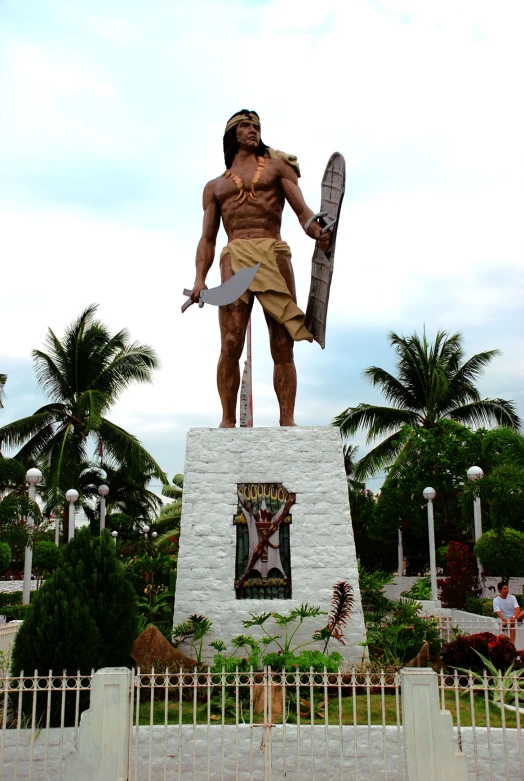 a man standing on top of a skateboard